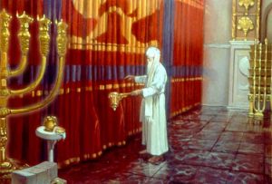 Priest before the veil